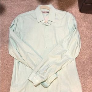 Express green polka dotted button up shirt